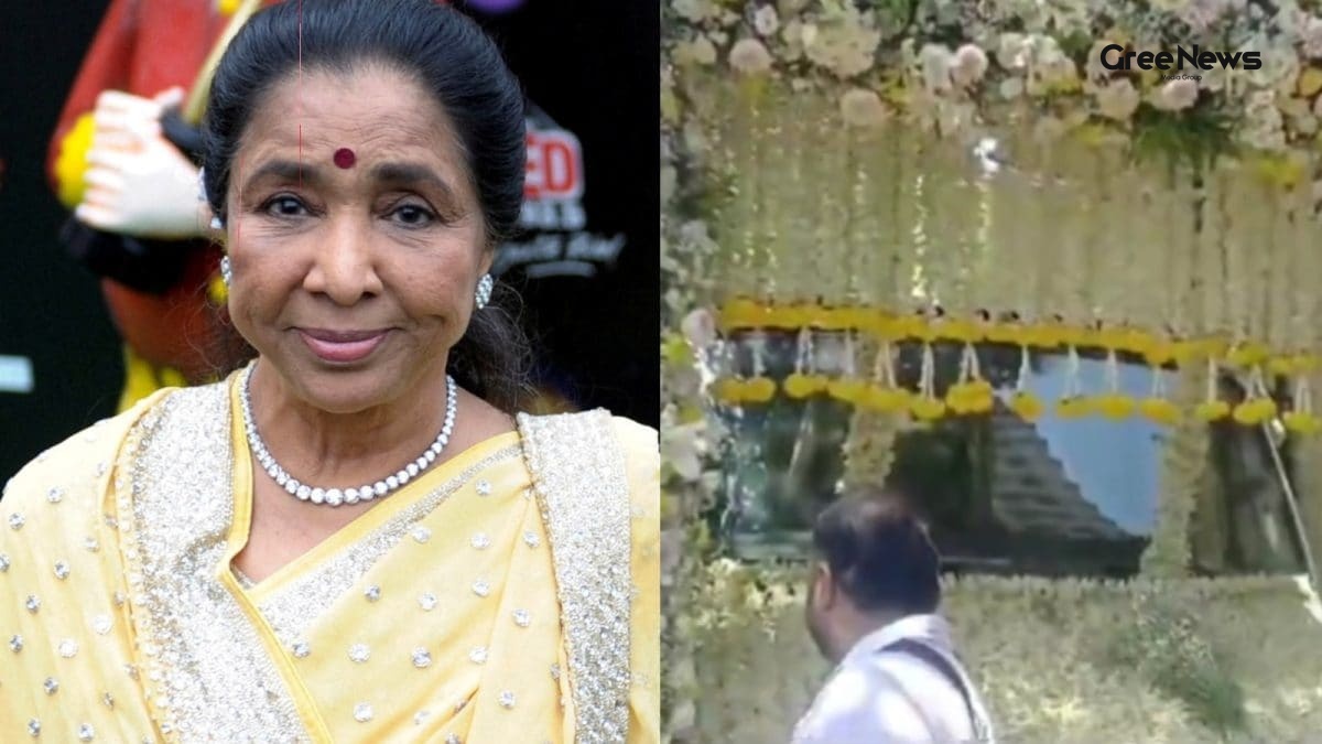 Asha Bhosle funeral cortege covered in white flowers moving through Mumbai streets