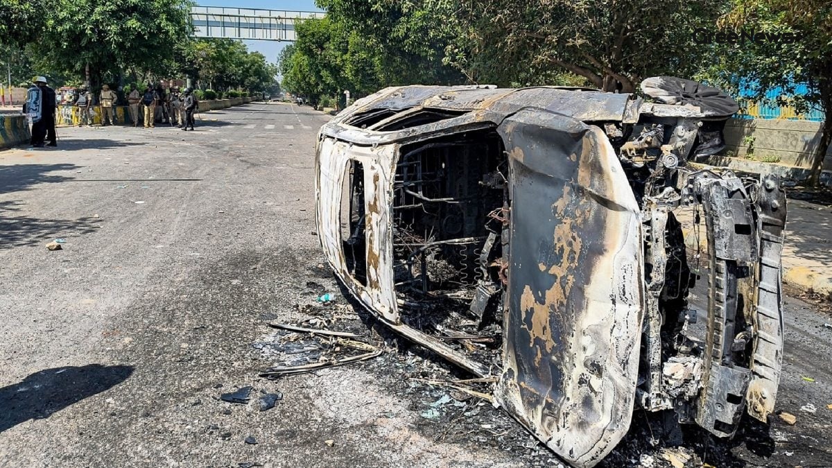 Car burnt during Noida protest