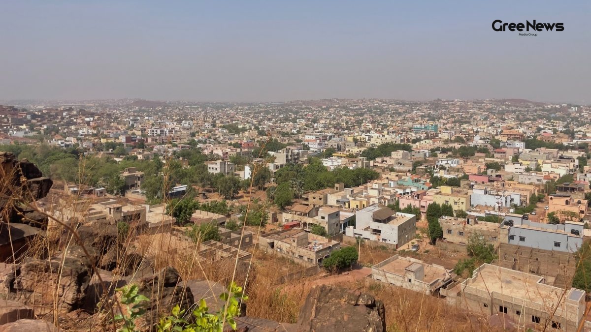 Mali army vehicles on a dusty road after the attacks
